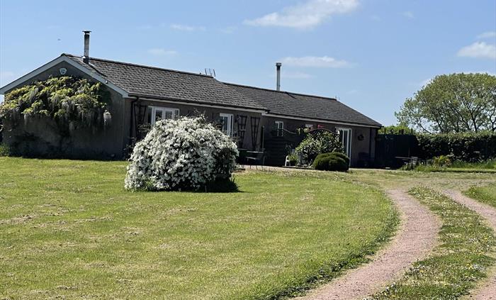 Blackthorn Lodge first bungalow on the left and Hawthorn Lodge second bungalow on the left.